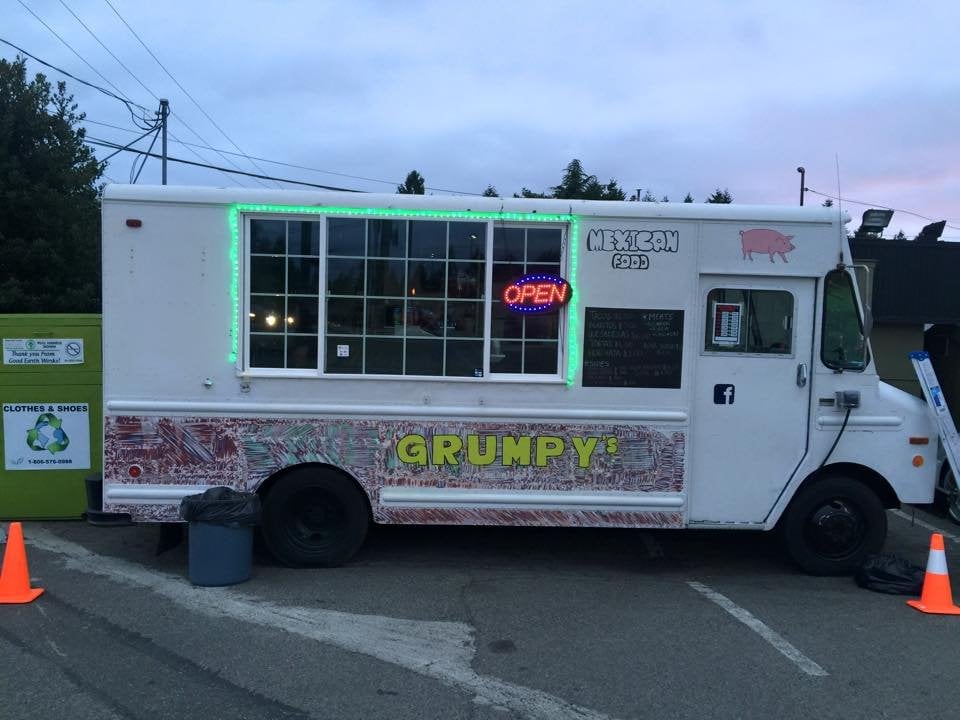 This white truck by Grumpy’s Food Truck serves Mexican meal in the streets of Seattle